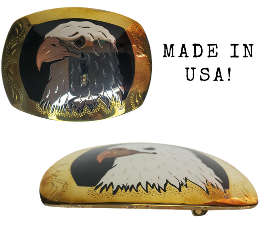 The Bald Eagle a symbol of the USA where this buckle is made! Handmade of German silver, a copper Eagle beak with a black resin inlay background and brass border.  rectangular buckle with a 2 3/4 x 3 “ size.  Available in our Smyrna TN shop just outside of Nashville.