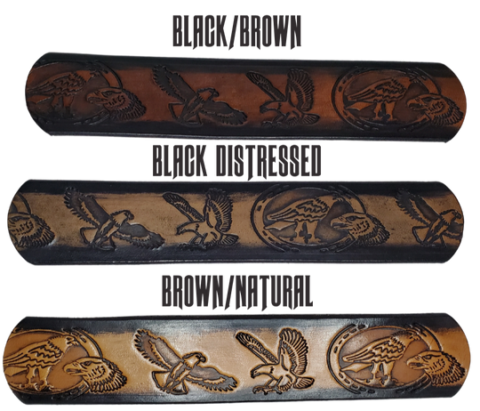 "The "Where Eagles Dare" is a handmade real leather belt made from a single strip of cowhide shoulder leather that is 8-10 oz. or approx. 1/8" thick. It has hand burnished (smoothed) edges and a 3 types of Eagles pattern. This belt is completely HAND dyed with a multi step finishing technic. The removeable antique nickel plated solid brass buckle is snapped in place with heavy snaps. Type Name or No Name in the Name box. This belt is made just outside Nashville in Smyrna, TN.