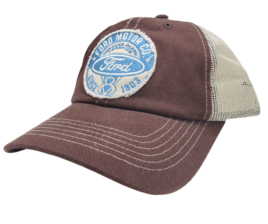 Wear your Ford Distressed Embroidered Trucker Cap with your head held high! The Brown twill front and Cream back feature a Ford graphics with a stitched bill, plus an adjustable snap strap to perfectly fit any size head. Take a short trip outside Nashville to our Smyrna, TN shop and get yours now!