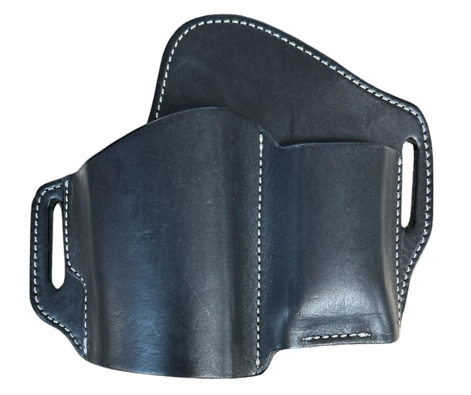 The Leather Belt Holster is a popular choice for everyday carry. Crafted with all leather and a slots for belt attachment, this holster also offers a slot for a magazine. See them at our local shop in Smyrna, TN. Choose Black or Brown and fit belts up to 1 3/4" width.