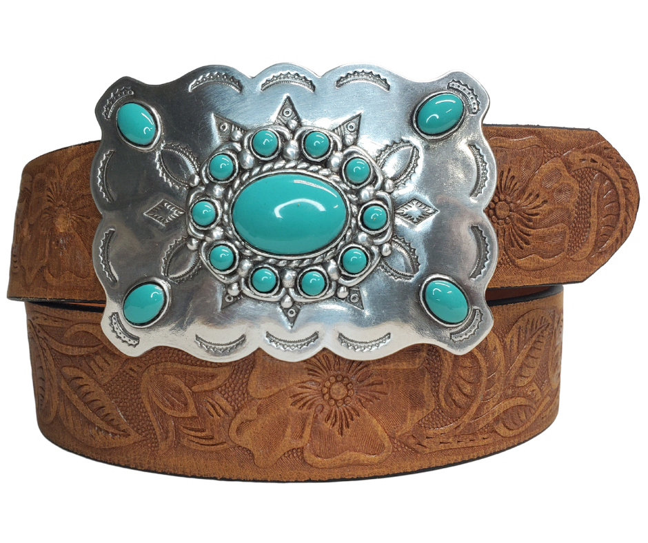 The "Cloverleaf" belt named after the pattern in Barrel racing has a Turquoise colored stone Buckle on distressed Brown western pattern design belt. Upgrade to the Turquoise Square western buckle that measures approx. 4" wide by 3" tall and also get the Basic Antique Nickel that looks great while Rodeoing or doin a 2 step. Belt has snaps for easy buckle change and is made from a single strip of Embossed leather. Available in our shop just outside Nashville in Smyrna, TN.