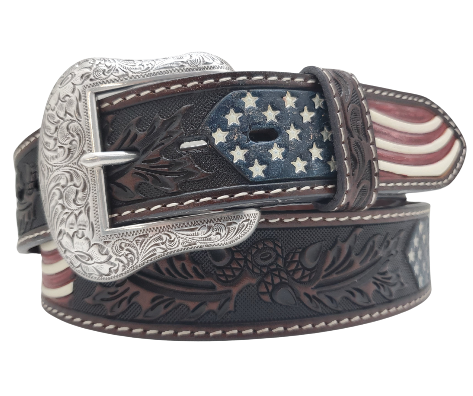 This embossed Old Glory real Veg-Tan leather belt starts with a 8-10oz leather belt strip. Comes with an Antique colored buckle that is snapped in for easy removal. It is available in our Smyrna, TN shop, which is located just outside of Nashville.