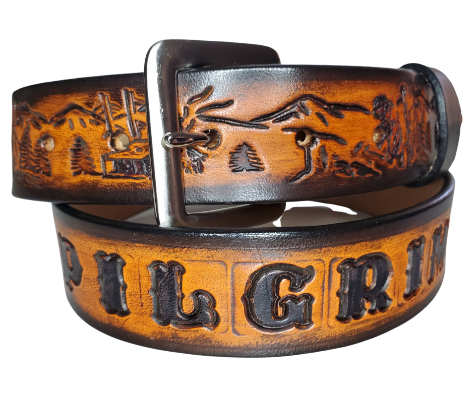 "The GRIZZLY" is our tribute to the "Pilgrim" Jeremiah Johnson! It's a professionally crafted, genuine leather belt made from 8-10 oz cowhide shoulder leather, approximately 1/8" thick. It boasts a hand burnished edge, along with a multi-step dye and finishing technique. The antique nickel plated solid brass buckle is affixed with heavy snaps. This belt is crafted near Nashville, TN in Smyrna.