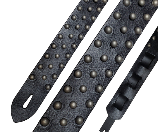 Metal Studs have been staple for years in Rock music!  "This 2" wide Guitar Strap is a nod to that classic influence. It's made from 1/8" thick Classic Black Pebble Grain Cowhide and after some gig's it'll look like you bought in a Vintage shop. The classic adjustment style goes from approx. 42" to 56" at it's longest . Made just outside Nashville in our Smyrna, TN. shop. It will need a bit of time to "break in" but will get a great patina over time.  