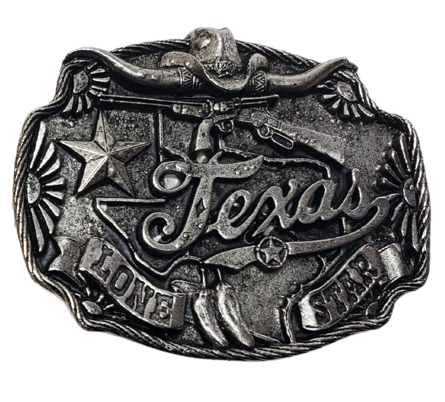 This may be the coolest TEXAS buckle we have with all of its awesome graphics. Look close to see a Longhorn, Hat, Lone Star, Chile Peppers and of course F?..&lt;: arms. Whether you visit our retail store in Smyrna, TN or shop online, don't miss the chance to add this unique piece to your collection.