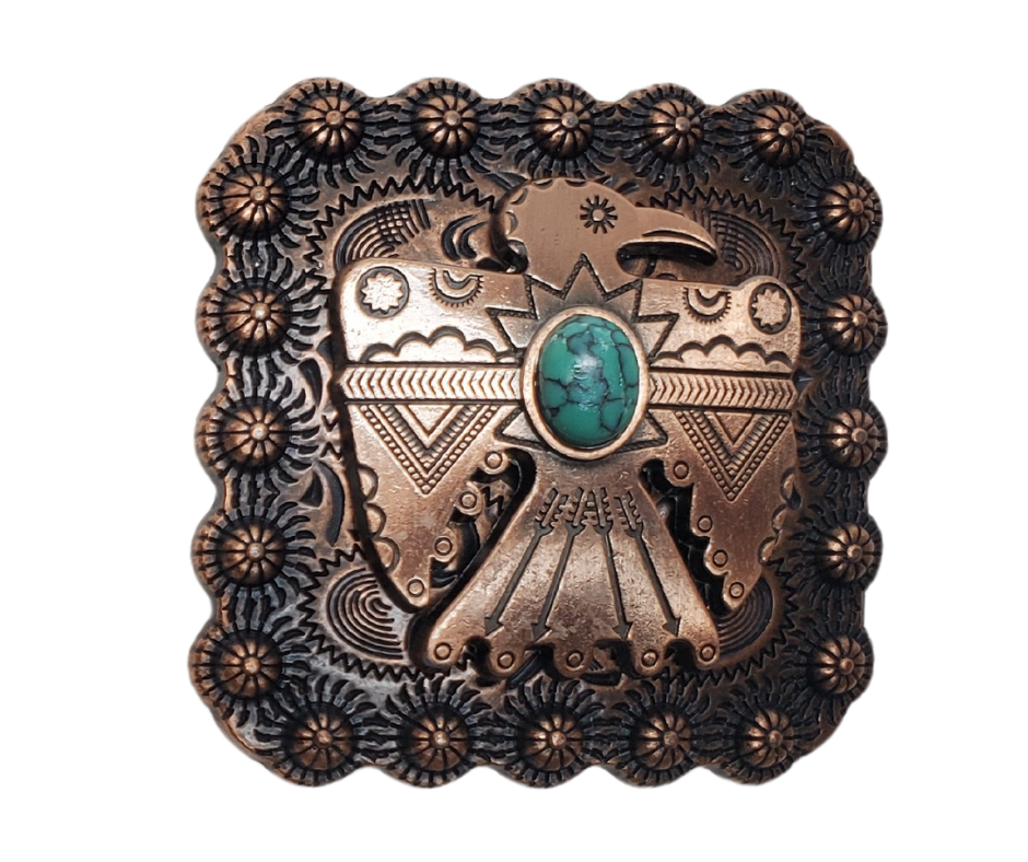 This Antiqued Copper colored square buckle features a Native American style T-bird with berries and a Turquoise colored center stone, all set against a western scrolled background. At just 2" square, it's the perfect addition to any collection. Check it out in our retail store in Smyrna, TN or shop online now.