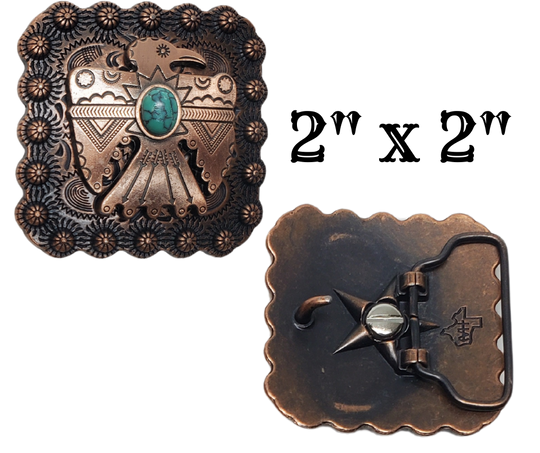 This Antiqued Copper colored square buckle features a Native American style T-bird with berries and a Turquoise colored center stone, all set against a western scrolled background. At just 2" square, it's the perfect addition to any collection. Check it out in our retail store in Smyrna, TN or shop online now.