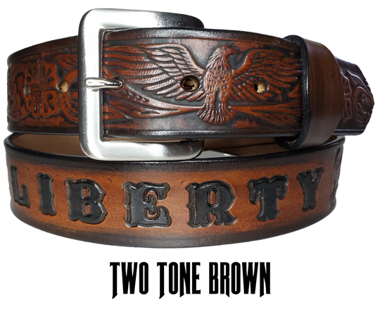 This Name Belt features a single strip of vegetable tanned leather in a patriotic pattern, highlighted by a flying eagle. The antique nickel-finished solid brass buckle is easily replaceable, allowing you to customize the design with your own buckle. It's crafted in our Smyrna, Tennessee shop, near Nashville.