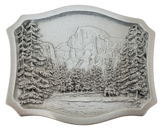 Shield shaped antique silver colored belt buckle with the well known Yosemite National Park scene with a 70's vibe.&nbsp;&nbsp;Available online and at our shop just outside Nashville in Smyrna, TN.