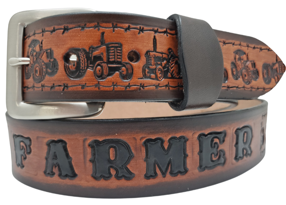 Our 1 1/2" width International Farmster Name Belt is for the one who gets up early and gets it done. Each belt features a unique hand-stained strip of vegetable tanned leather, adorned with a bold and timeless Tractors with a barbwire border. The antique nickel finish solid brass buckle can be effortlessly swapped out and choose from 3 finishes. Crafted by hand at our Smyrna, Tennessee shop, just a stone's throw away from Nashville.