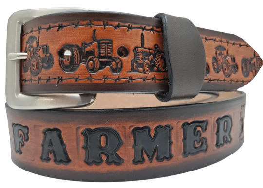 Our 1 1/2" width International Farmster Name Belt is for the one who gets up early and gets it done. Each belt features a unique hand-stained strip of vegetable tanned leather, adorned with a bold and timeless Tractors with a barbwire border. The antique nickel finish solid brass buckle can be effortlessly swapped out and choose from 3 finishes. Crafted by hand at our Smyrna, Tennessee shop, just a stone's throw away from Nashville.