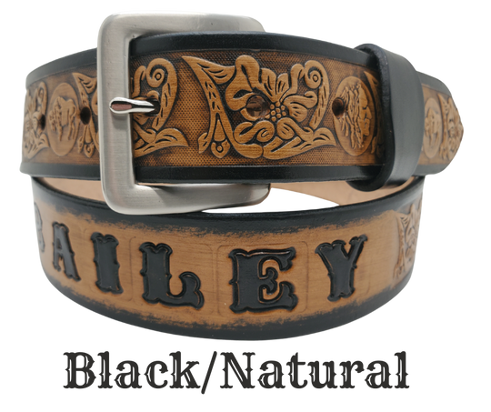 This unique Name Belt features a hand-stained strip of vegetable tanned leather, displaying a Western Scroll design and both sides of the iconic Buffalo Nickel pattern. The antique nickel finish solid brass buckle can be easily changed. Handcrafted in our Smyrna, Tennessee shop, near Nashville.