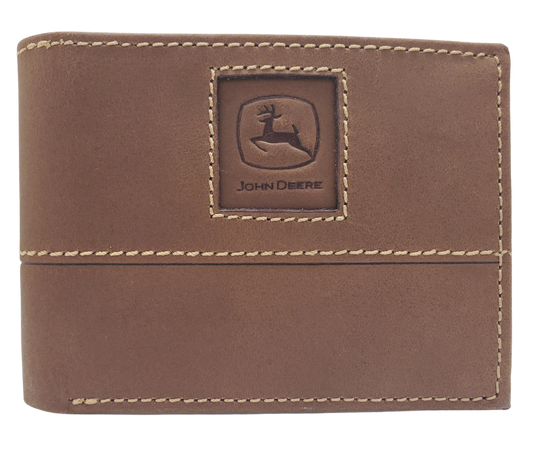 Fully Licensed John Deere Logo Bifold Wallet. Made from Distressed Brown leather with contrast stitched antique white thread. Classic Bifold design with 6 canvas card slots along 2 underside pockets, large cash slot featuring a doubled sided flip style I.D. slots. In stock at our Smyrna, TN retail store 30 min. from downtown Nashville. Imported.