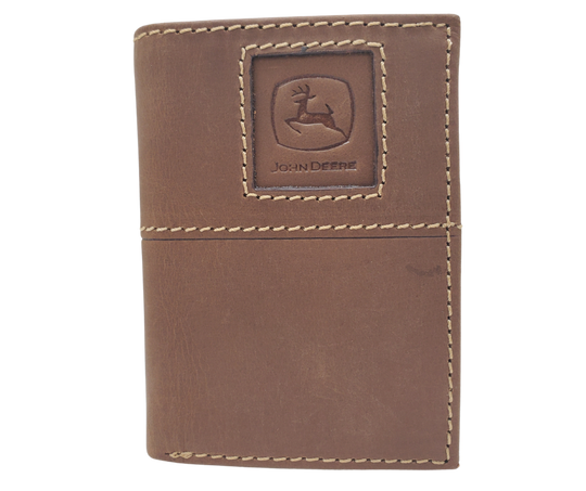 Fully Licensed John Deere Logo Trifold Wallet. Made from Distressed Brown leather with contrast stitched antique white thread. Classic Trifold design with 6 canvas card slots along 2 underside pockets, large cash slot featuring a doubled sided flip style I.D. slots. In stock at our Smyrna, TN retail store 30 min. from downtown Nashville. Imported.