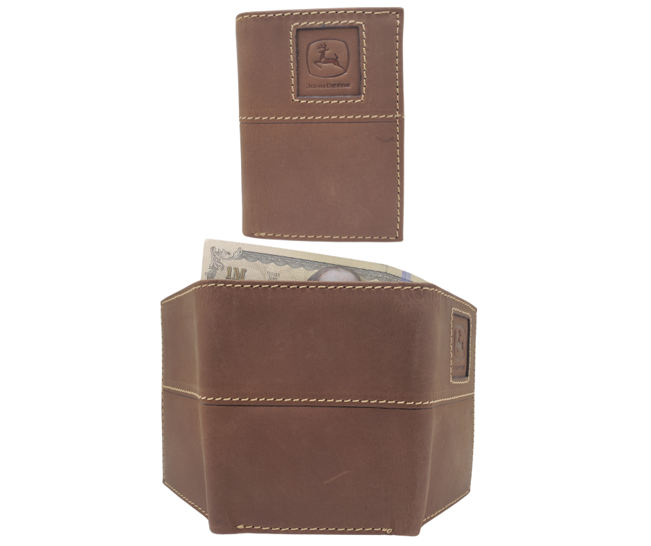 Fully Licensed John Deere Logo Trifold Wallet. Made from Distressed Brown leather with contrast stitched antique white thread. Classic Trifold design with 6 canvas card slots along 2 underside pockets, large cash slot featuring a doubled sided flip style I.D. slots. In stock at our Smyrna, TN retail store 30 min. from downtown Nashville. Imported.