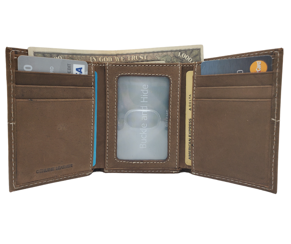 Fully Licensed John Deere Green and Yellow Logo Trifold Wallet. Made from Distressed Brown leather with contrast stitched antique white thread. Classic trifold design with 6 card slots along 2 underside pockets, a I.D. pocket and large cash slot. In stock at our Smyrna, TN retail store 30 min. from downtown Nashville.