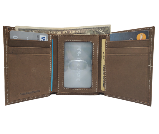 Fully Licensed John Deere Green and Yellow Logo Trifold Wallet. Made from Distressed Brown leather with contrast stitched antique white thread. Classic trifold design with 6 card slots along 2 underside pockets, a I.D. pocket and large cash slot. In stock at our Smyrna, TN retail store 30 min. from downtown Nashville.