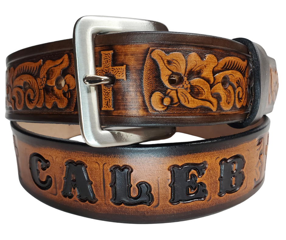 Named after the well known Bible verse...Choose this day whom you will serve! Experience a western-inspired flair with the "Joshua 24:15" Name Leather Belt. Featuring a striking floral pattern and Cross running along its length, you can even customize the name with up to 10 letters. Crafted from 1/8" thick leather and 1 1/2" wide, its Antiqued Solid Buckle Silver is attached with two snaps for an easy change. Take the next step and order yours online or visit our shop in Smyrna, TN, near Nashville.