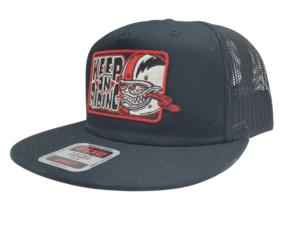 Get ready to ride with the Keep On Riding Bobber Monster Flat Bill Snapback Cap! This trendy cap features a mesh back, structured top to keep its shape, and a bold red embroidered patch that exclaims "Keep on Riding" with a graphic of a fierce Bobber Monster. Available now at our shop just outside Nashville in Smyrna, TN. Are you ready to take on the road in style?