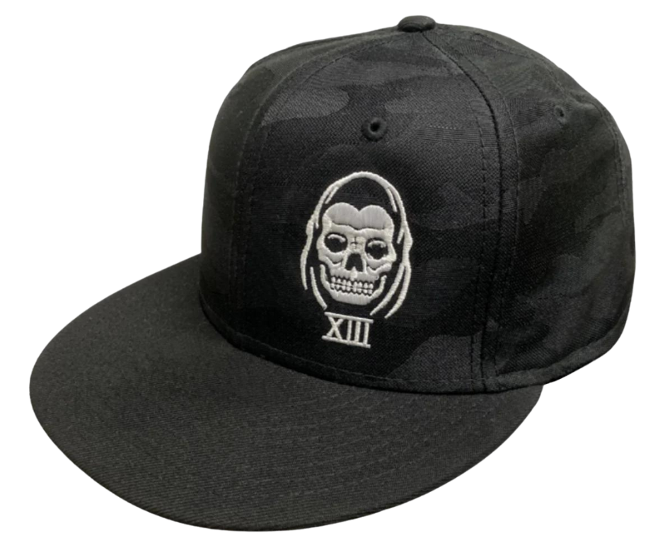 The Lucky 13 Speed Reaper "all over" Camo snapback trucker cap has the "Reaper-inspired" graphic on front and a "13" embroidered on the back left side. There is an adjustable snap back to assist in helping this hat fit almost any size head. Come and and get'em at our Smyrna, TN shop a short ride outside Nashville.

COLOR: BLACK