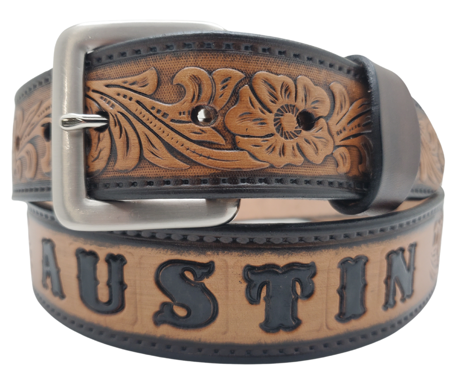 Unleash your western inner self with The "Lariat" Name Belt. Each belt features a unique hand-stained strip of vegetable tanned leather, adorned with a bold and timeless Western Floral pattern. The antique nickel finish solid brass buckle can be effortlessly swapped out. Crafted by hand at our Smyrna, Tennessee shop, just a stone's throw away from Nashville.