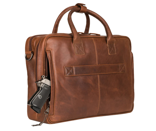 The Executive Computer leather briefcase is available at our Smyrna, TN shop. crafted with premium full-grain leather for durability and a vintage look. This spacious design briefcase has 2 compartments. The front compartment has a RFID organizer with 5 card slots, 2 pen sleeves, 3 open slip pockets secured with a zipper closure. The back padded laptop compartment, zippered pocket on the front. Removable shoulder strap and soft carry handles. Attach your laptop briefcase to rolling luggage.