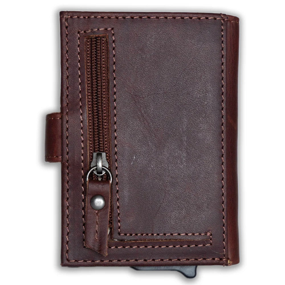 The Nova Auto Pop-Up Wallet is available at our Smyrna, TN shop. A minimalist design and practicality. Made from premium full-grain leather. It offers ample storage for up to 8 cards, an ID, bills, and coins. The unique auto pop-up mechanism allows quick access to your cards with a simple push, while built-in RFID protection keeps your personal information secure.

Wallet Dimensions:&nbsp;4" L x 3" H x .75" D