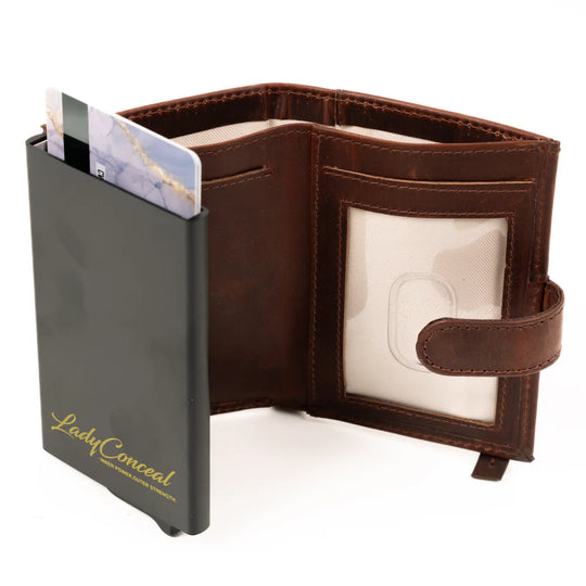 The Nova Auto Pop-Up Wallet is available at our Smyrna, TN shop. A minimalist design and practicality. Made from premium full-grain leather. It offers ample storage for up to 8 cards, an ID, bills, and coins. The unique auto pop-up mechanism allows quick access to your cards with a simple push, while built-in RFID protection keeps your personal information secure.

Wallet Dimensions:&nbsp;4" L x 3" H x .75" D