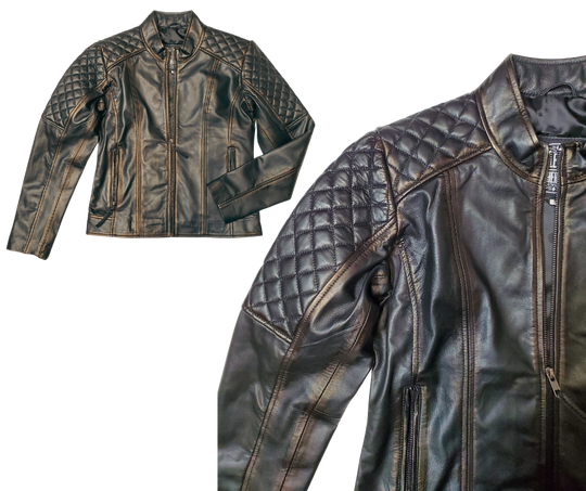 This Distressed Brown Lamb skin jacket is soft and supple a update of a timeless classic. with a fashionable European style, it features black lining, antique silver hardware, and 2 outside pockets and two inside pockets. You can find it near Nashville, in Smyrna, TN.