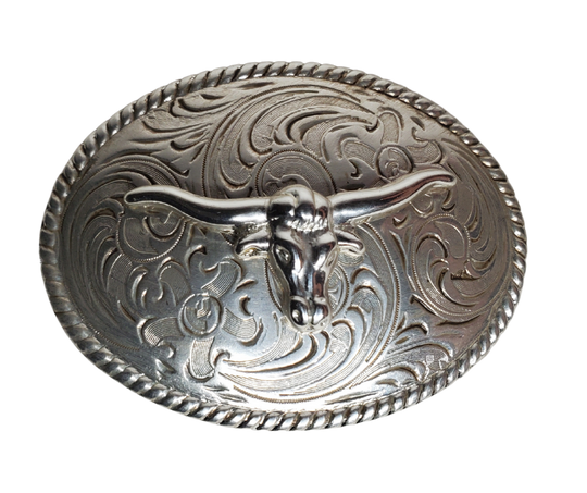 Let the little ones express their inner cowboy with this awesome longhorn belt buckle! Featuring a scroll background, rope border, in antique silver, this approx. 2" x 3" buckle looks great with a 1 1/4" belt. Saddle up and purchase yours in our Smyrna, TN (near Nashville) store or online.