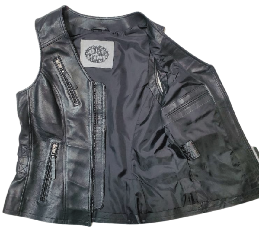 This super soft Lambskin ladies' vest features zippered pockets, V-neck design, and buckle detailing on the sides for a comfortable look. The 3 panel back, lower back zippered gussets, and zipperd front closure add to the practicality of this vest.&nbsp; Visit our leather shop in Smyrna, TN, near Nashville, and choose from sizes small to 5x.  Includes inside Carry conceal pockets, 3 zippered outside pockets  3 panel back with lower gussets for extra comfort