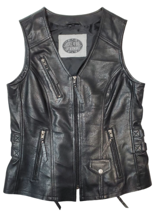 This super soft Lambskin ladies' vest features zippered pockets, V-neck design, and buckle detailing on the sides for a comfortable look. The 3 panel back, lower back zippered gussets, and zipperd front closure add to the practicality of this vest.&nbsp; Visit our leather shop in Smyrna, TN, near Nashville, and choose from sizes small to 5x.  Includes inside Carry conceal pockets, 3 zippered outside pockets  3 panel back with lower gussets for extra comfort