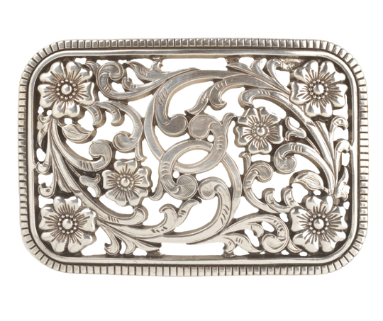 Get the perfect blend of Western and non-Western style with this Antique Silver buckle featuring a Filigreed Vine and Flower scroll design. The rectangular shape with rounded edges and rope design border adds a unique touch to any outfit. It's 3" tall by 4" wide, fitting belts up to 1 1/2" wide. Find it at our retail shop in Smyrna, TN or conveniently purchase it online. Imported