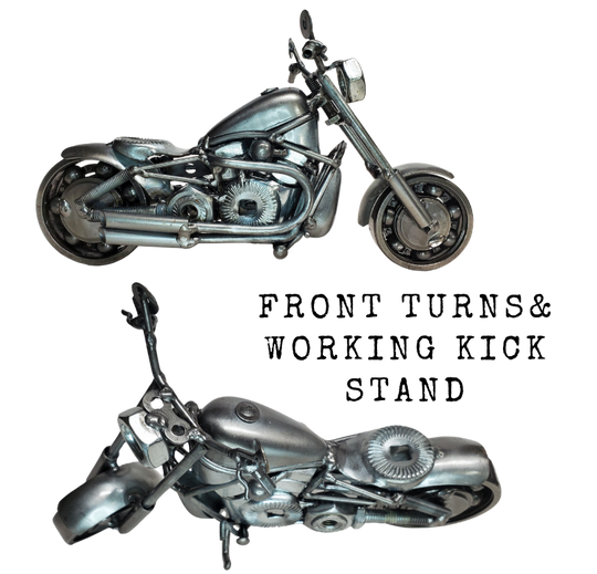 Enhance your Man Cave with this one-of-a-kind motorcycle metal art! A great gift for any motorcycle lover, this piece was crafted with nuts, bolts, washers, springs, and bearing wheels for a unique touch. It even stands on its own, thanks to the kickstand. For specific measurements, please refer to the photo. Motorcycle METAL artwork is currently available at our Smyrna store, just minutes from Nashville, TN.