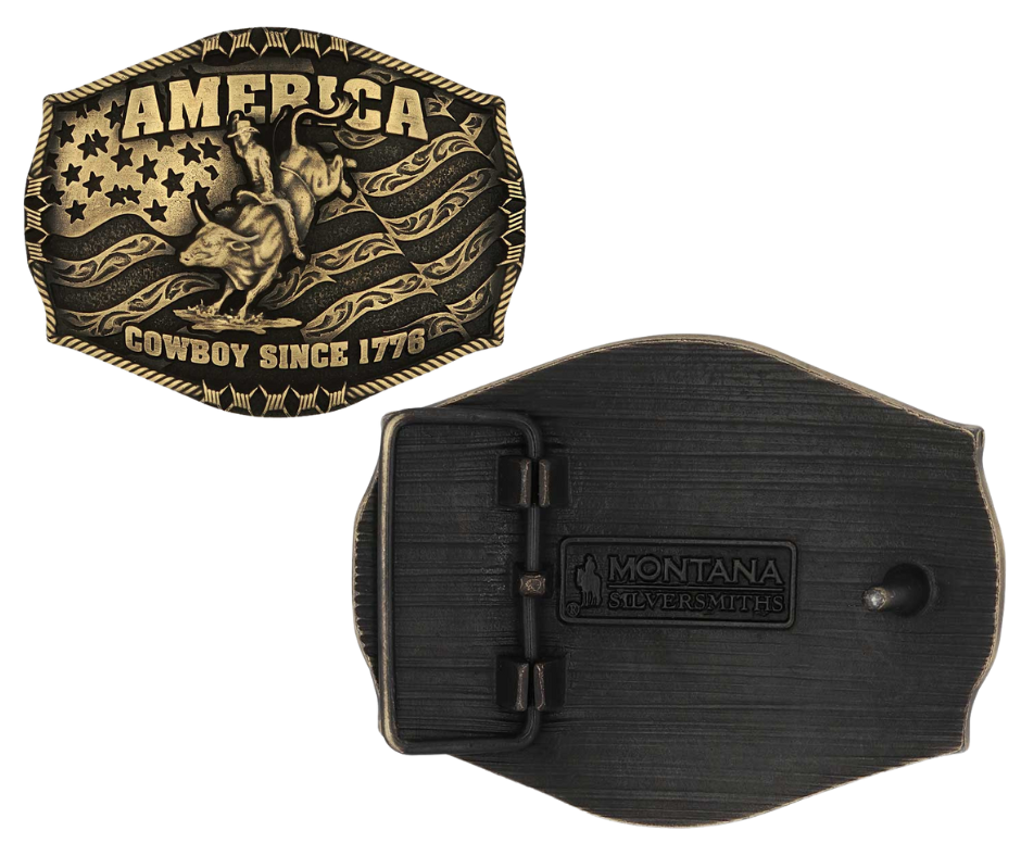 Stand for liberty and Western heritage for all with the Cowboy Since 1776 Attitude Buckle. The waving American flag provides the backdrop for the design. The word "America" sits above the bull rider figure. The words "Cowboy Since 1776" is beneath the bull rider figure. A roped border with barbed wire design creates the edge of the buckle, giving the piece a rustic look. Fits 1.5 inch belts. Find it online or at our shop just outside Nashville in Smyrna, TN.&nbsp;