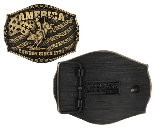 Stand for liberty and Western heritage for all with the Cowboy Since 1776 Attitude Buckle. The waving American flag provides the backdrop for the design. The word "America" sits above the bull rider figure. The words "Cowboy Since 1776" is beneath the bull rider figure. A roped border with barbed wire design creates the edge of the buckle, giving the piece a rustic look. Fits 1.5 inch belts. Find it online or at our shop just outside Nashville in Smyrna, TN.&nbsp;