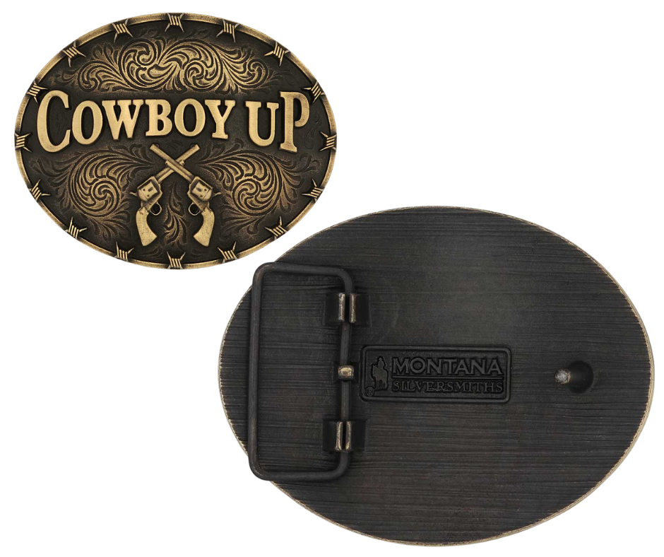 Saddle up with the Cowboy Up Attitude Buckle. This buckle features the words "Cowboy Up" with two crossed revolvers underneath. Unique barbed wire designs adorn the edge of the buckle with additional antiquing near the edge. Fits 1.5 inch belts. Find it online or at our shop just outside Nashville in Smyrna, TN. By Montana Silversmith Approx. 4" x 3" Brass over white metal alloy. Protective coating.