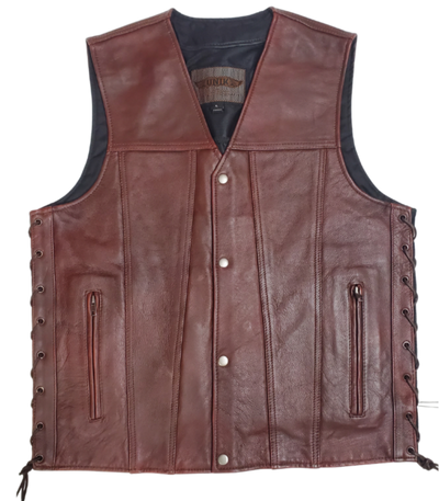 Experience a throwback vibe with our Oxblood Side Lace Leather Vest, perfect for any motorcycle ride. Crafted from cowhide, this vest features convenient conceal carry pockets on the front and a 1 panel back for comfort and style. The snap front closure and classic v-neck add to the overall appeal. Find it at our leather shop in Smyrna, TN, near Nashville in sizes small to 5x.