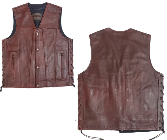 Experience a throwback vibe with our Oxblood Side Lace Leather Vest, perfect for any motorcycle ride. Crafted from cowhide, this vest features convenient conceal carry pockets on the front and a 1 panel back for comfort and style. The snap front closure and classic v-neck add to the overall appeal. Find it at our leather shop in Smyrna, TN, near Nashville in sizes small to 5x.