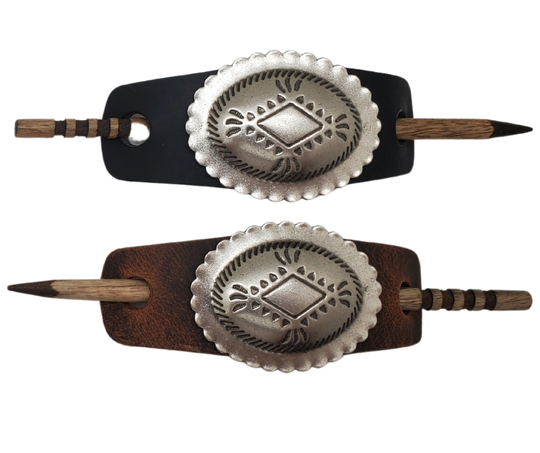 Take your hair barrettes to the next level with our Antique Silver finish Conchos, available in Black or Desert Brown Leather of your choice. Each one comes with an ornate wooden stick to keep your long locks in place. These are proudly made in our Smyrna, TN shop, just a short drive from the famous downtown Nashville.