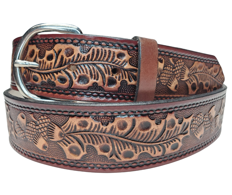 This Leather belt has The Classic Oak Scroll pattern in a Brown Antiqued finish. Available in a 1 1/2" width. Full grain vegetable tanned cowhide, Width 1 1/2" and includes Nickle plated buckle Smooth burnished painted edges. Made in USA! Buckle snaps in place for easy changing if desired. In stock at our Smyrna, TN shop.