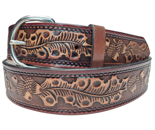 This Leather belt has The Classic Oak Scroll pattern in a Brown Antiqued finish. Available in a 1 1/2" width. Full grain vegetable tanned cowhide, Width 1 1/2" and includes Nickle plated buckle Smooth burnished painted edges. Made in USA! Buckle snaps in place for easy changing if desired. In stock at our Smyrna, TN shop.