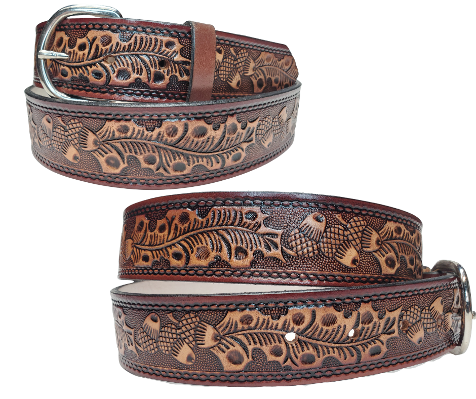 This leather belt has The Classic Oak Scroll pattern in a Brown Antiqued finish. Available in a 1 1/2" width. Full grain vegetable tanned cowhide, Width 1 1/2" and includes Nickle plated buckle Smooth burnished painted edges. Made in USA! Buckle snaps in place for easy changing if desired. In stock at our Smyrna, TN shop.