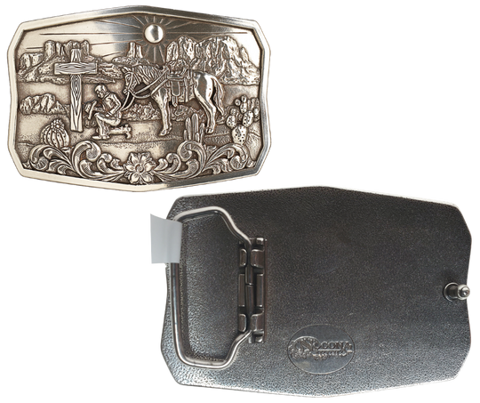 This handsome, one-of-a-kind buckle displays an antiqued silver finish, an old wooden cross, and a cowboy in prayer to our Lord, all against a hot desert backdrop. At approx. 2 1/2" tall and 3 1/2" wide, it fits belts up to 1 1/2" wide and is available for purchase from our physical store in Smyrna, Tennessee as well as our online store. Imported.