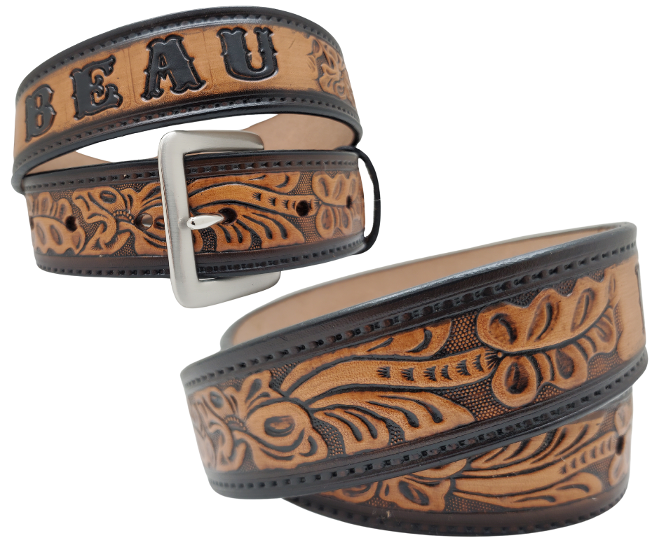 Get ready for an unforgettable Rodeo adventure with The "Pendleton" Name Belt! This one-of-a-kind belt features a 1 1/2" width and is hand-stained with a strip of vegetable tanned leather. The bold design includes a embossed stitch border and Classic Tooled center pattern, while the solid brass buckle in antique nickel finish adds a touch of ruggedness. Handcrafted at our shop in Smyrna, Tennessee, just outside Nashville.