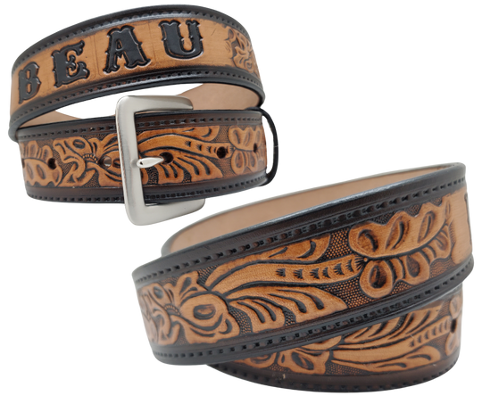 Get ready for an unforgettable Rodeo adventure with The "Pendleton" Name Belt! This one-of-a-kind belt features a 1 1/2" width and is hand-stained with a strip of vegetable tanned leather. The bold design includes a embossed stitch border and Classic Tooled center pattern, while the solid brass buckle in antique nickel finish adds a touch of ruggedness. Handcrafted at our shop in Smyrna, Tennessee, just outside Nashville.