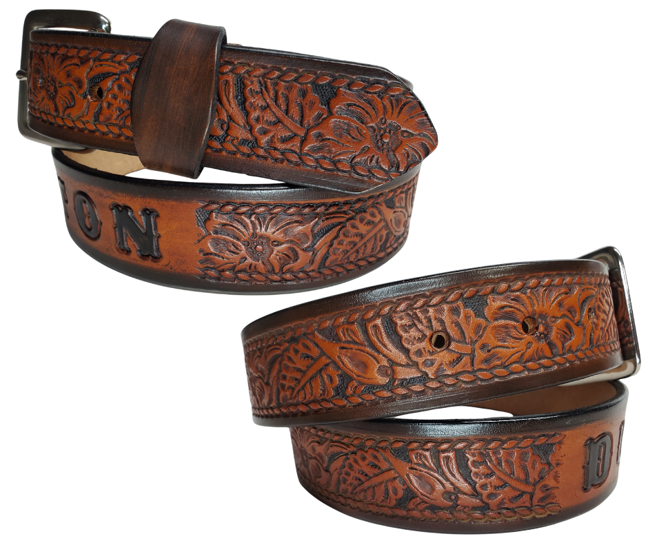 This personalized Vegtan leather belt, aptly named "The Ranch," with it's Western scroll pattern framed in a Rope edge border. Made in Smyrna, TN, close to Nashville. It's interchangeable solid brass buckle ensures convenience while maintaining high quality. Elevate any outfit with this stylish and versatile accessory.