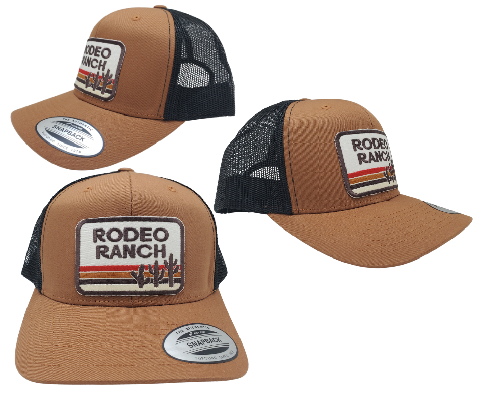 Get ready for your night out with our Rodeo Ranch Retro Cactus Cap! This trendy Embroidered Trucker Cap boasts a bold sandy color, hot desert vibes, and an iconic cactus design. Featuring a cool black mesh back, a stylish tan front, and a convenient snapped adjustable strap. Grab yours today at our shop in Smyrna, TN, right outside Nashville