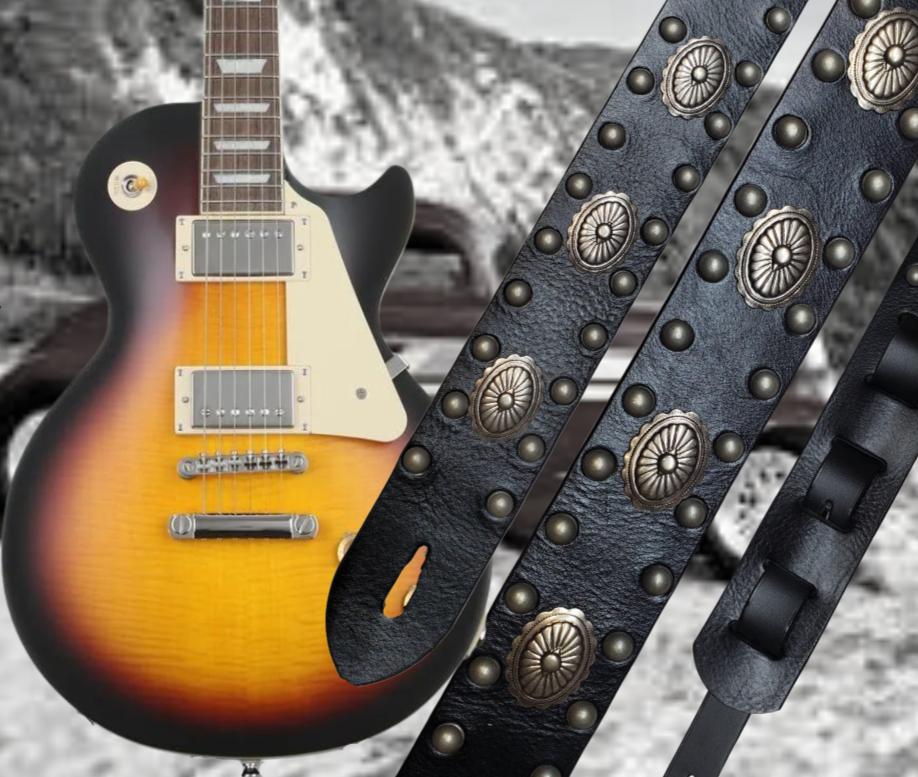 Les Paul's and Billy Gibbon's have been staple for years in Rock music!  "This 2" wide Guitar Strap is a nod to that classic influence. It's made from Pebbled Veg-Tan Cowhide and after some gig's it'll look like you bought in a Vintage shop. The classic adjustment style goes from approx. 42" to 56" at it's longest . Made just outside Nashville in our Smyrna, TN. shop. It will need a bit of time to "break in" but will get a great patina over time.   