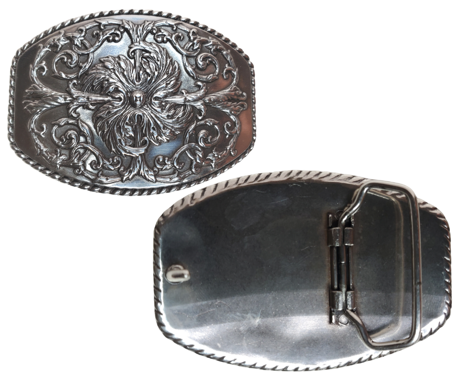 This stylish Antique Silver buckle features an Oval shape with a raised western scroll pattern. It is designed to fit 1 1/2" belts and measures approximately 2.5" x.3", Imported